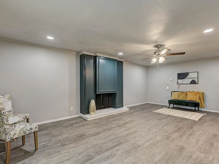 Huge living room with wet bar and patio access.