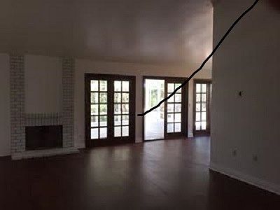 french doors leading out to sunroom