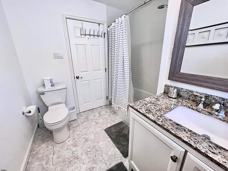 7407 Ventnor Ave — Photo 36