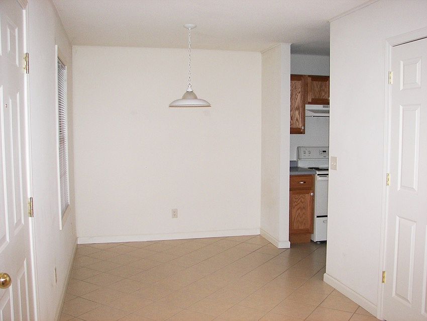 Dining area and view of kitchen