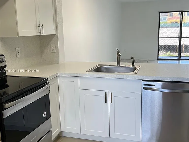 852 NE 209th St #104-38 — Photo 1