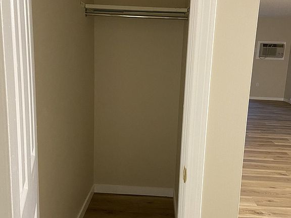 Walk-in storage closet off dining room.