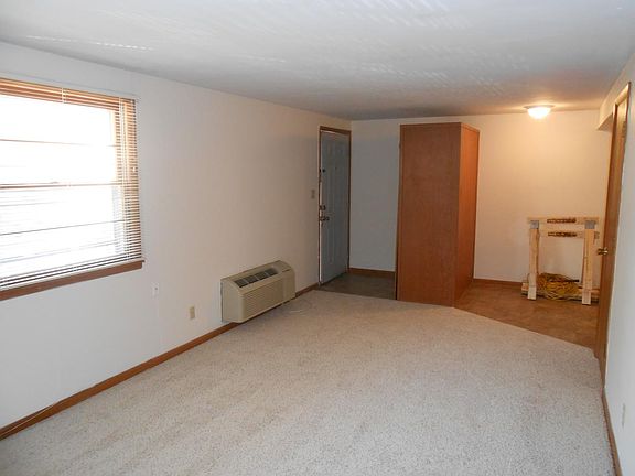 Living room looking to front door
