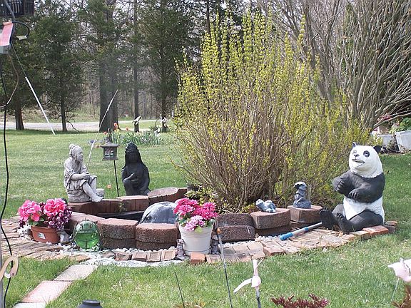 small man made pond with fountain
