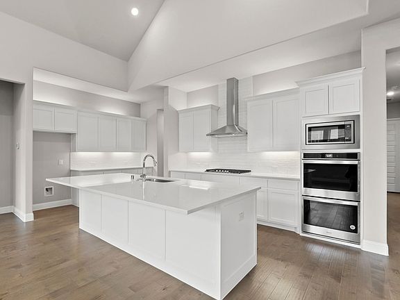 Kitchen in the Tennyson home plan by Trophy Signature Homes