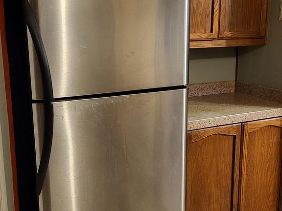 Refrigerator and kitchen cabinetry