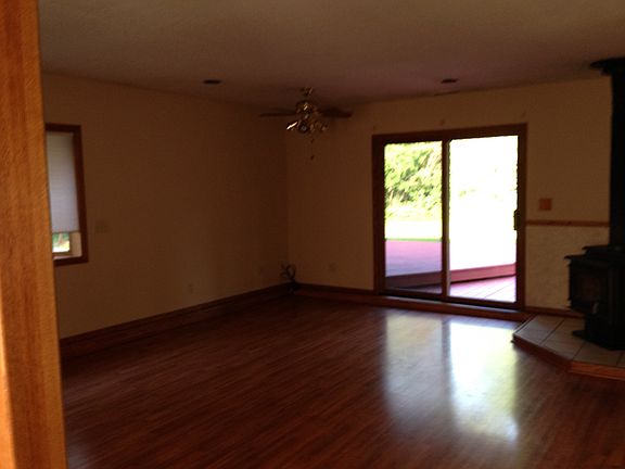 Fron room w/ wood fireplace