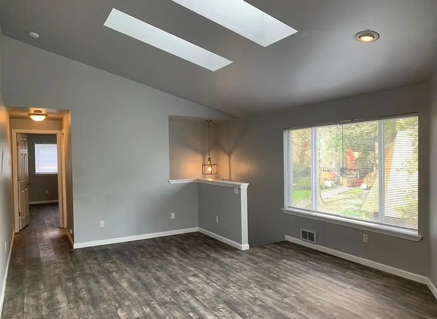 Spacious 3-Bed Townhome with Private Yard & Garage — Photo 4