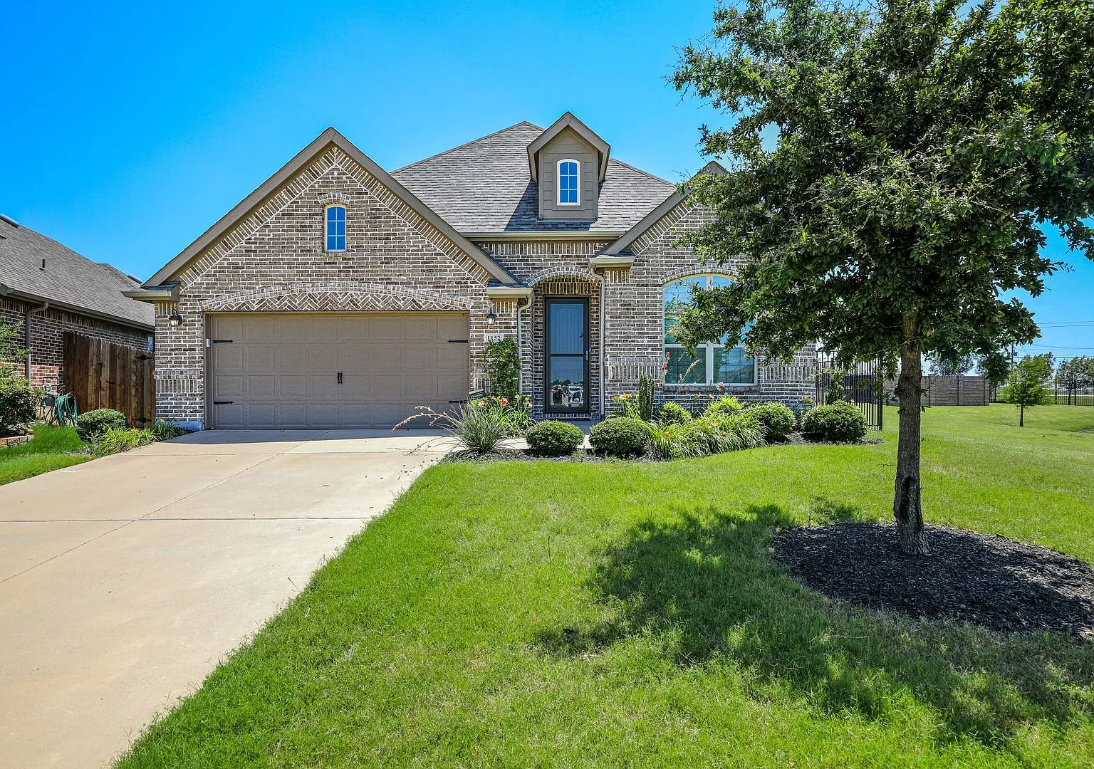 Breathtaking 3 Bedroom Home Overlooking the Community Lake in Celina! — Photo 1