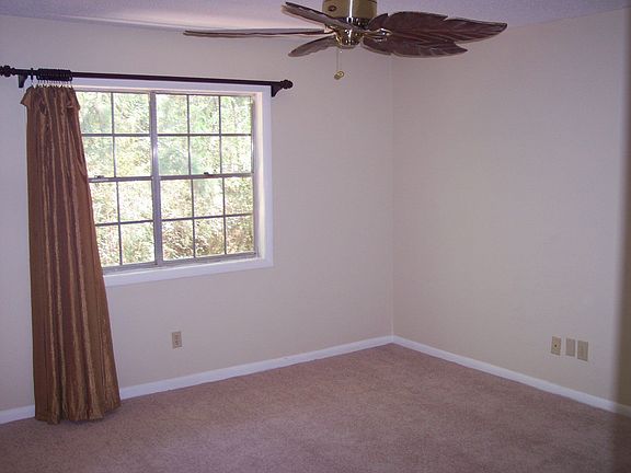 Huge bedroom with large walk-in closet and new carpet