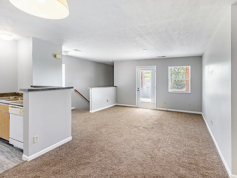 Townhome style upper unit with private balcony