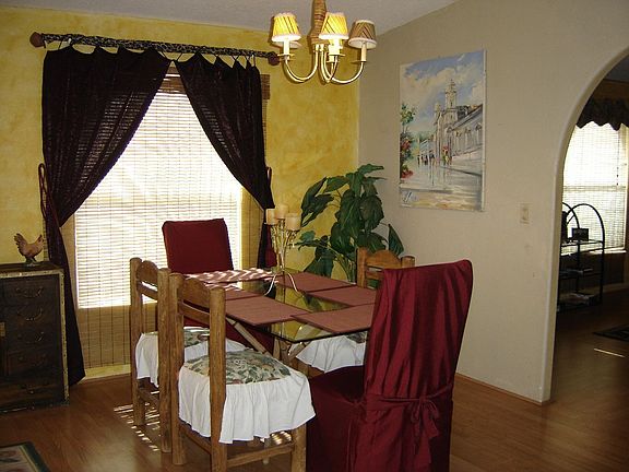 The Formal dining room is custom painted and is centrally located.