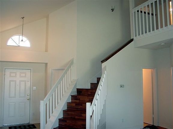 The stairwell adds to the look of luxury.