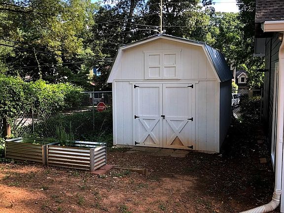Large 10'x16' shed with overhead storage. Big enough to hold bikes, kayaks, paddleboards and more!