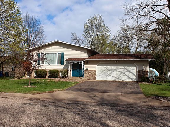 Spring season's view of front of house off of Oak St.