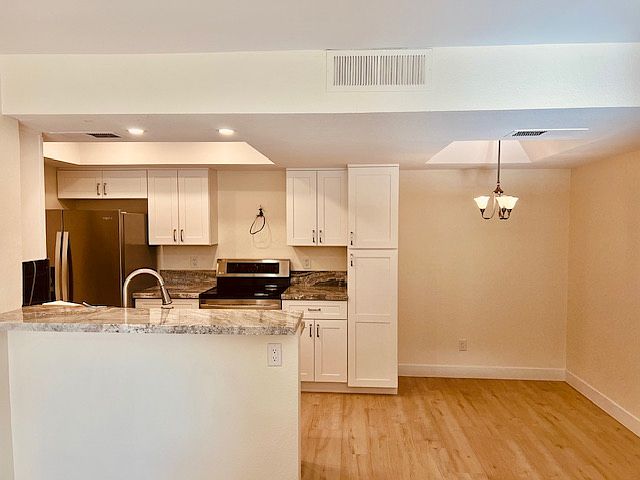 New kitchen with pantry. A microwave and cabinet are being installed this week.