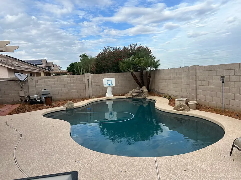 Pool with weekly cleaning service. Zero Landscape back yard
covered patio off Arkansas room fully fenced in HOA community