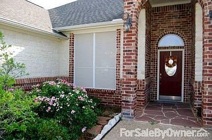 Entrance with dining room windows