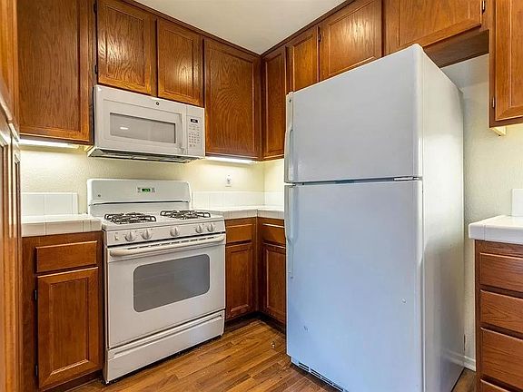 Kitchen complete with appliances.