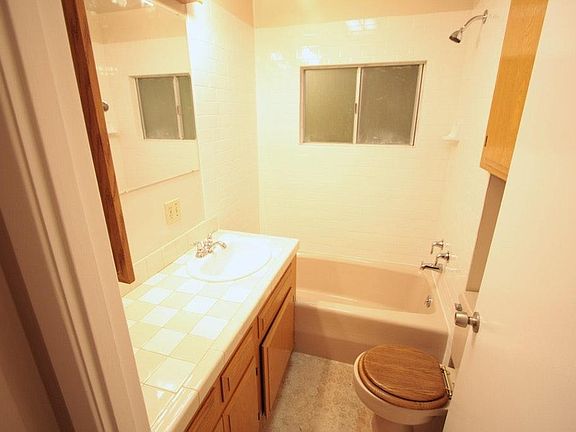 Tiled full bath , lots of storage...shower and tub. New toilet and shower head.