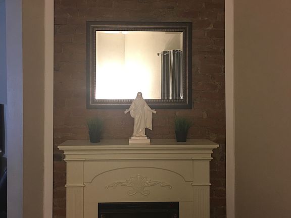 fireplace in front LIving rm