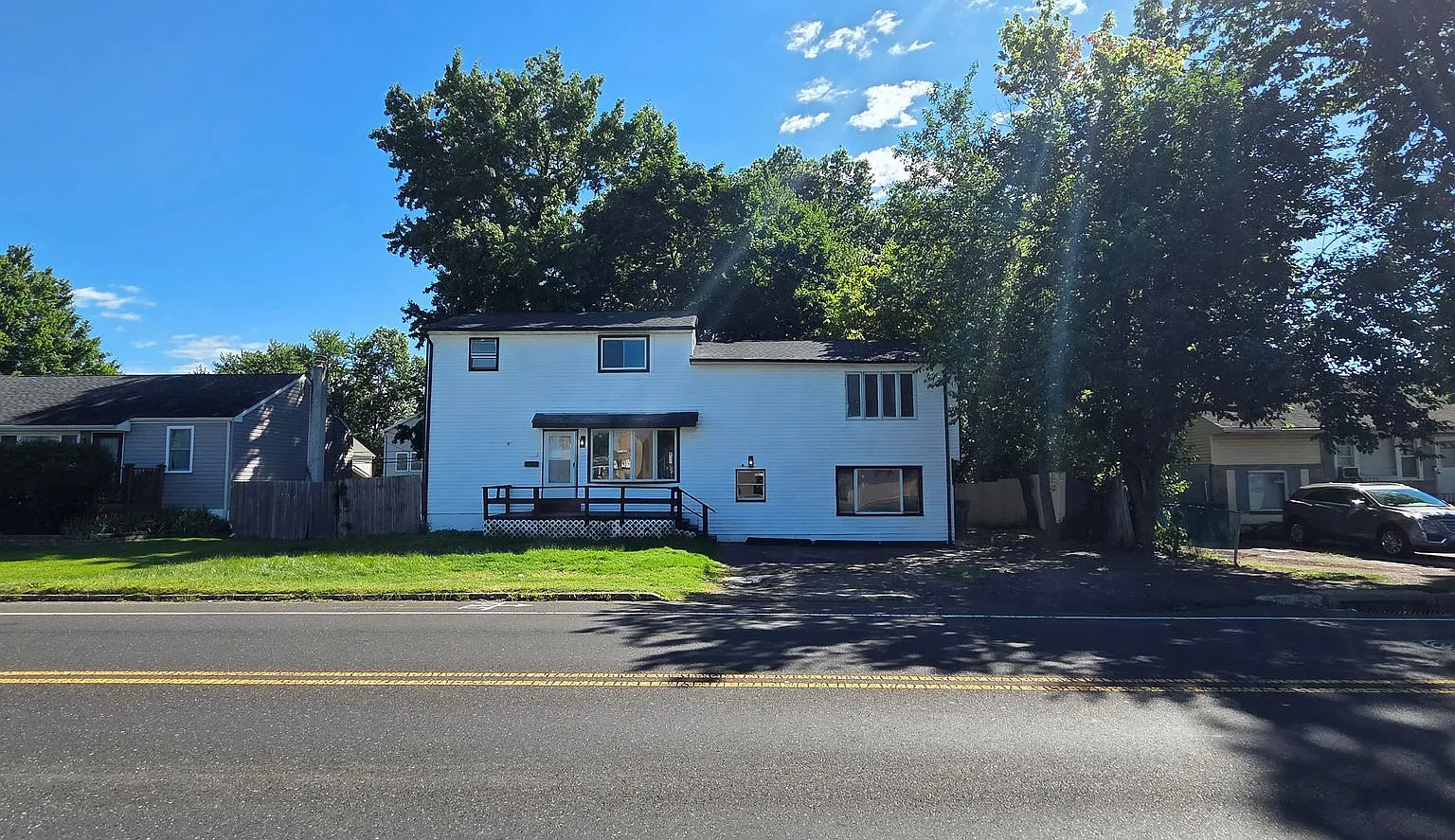 Freshly Updated 6-Bedroom Home with Yard & Driveway — Photo 2