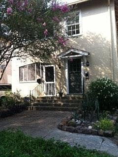 7615 is the downstairs apartment with the screened in front