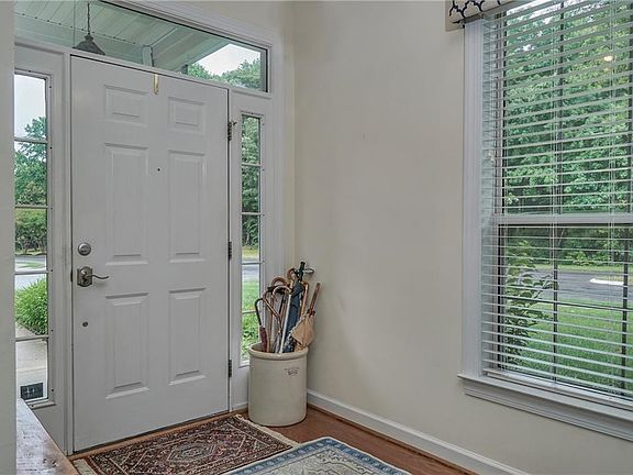 Entry way with beautiful hardwood flooring