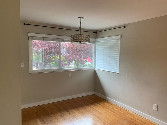 Dining area off kitchen with corner window