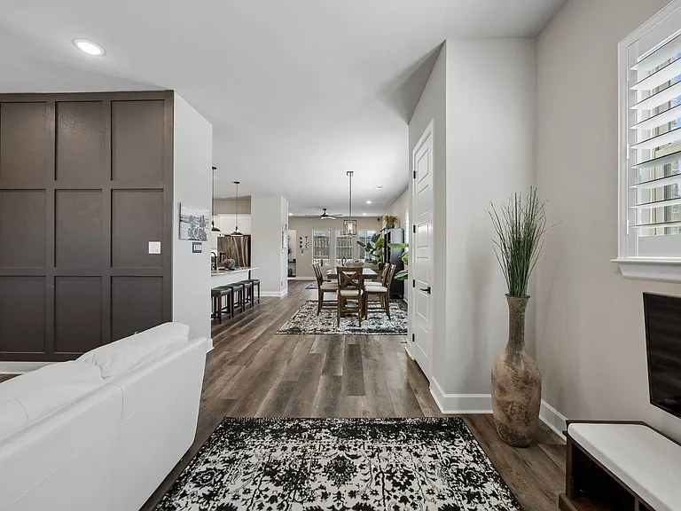 Open concept entry with plenty of windows and natural light