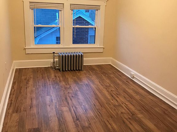 Bedroom with closet fits a queen size bed.