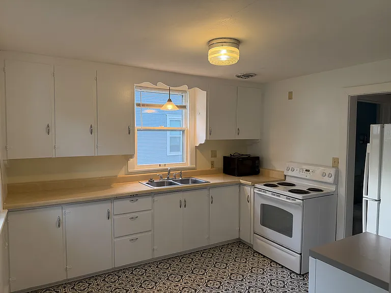 Full service kitchen complete with a brand new dishwasher