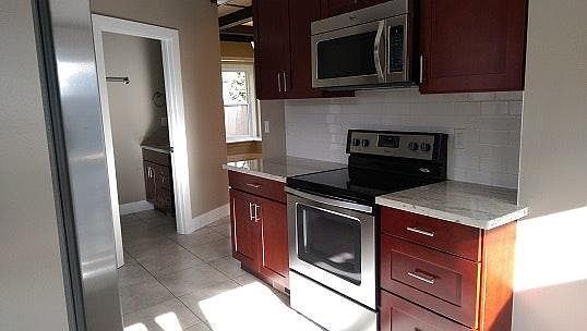 Brand new kitchen with granite counter top