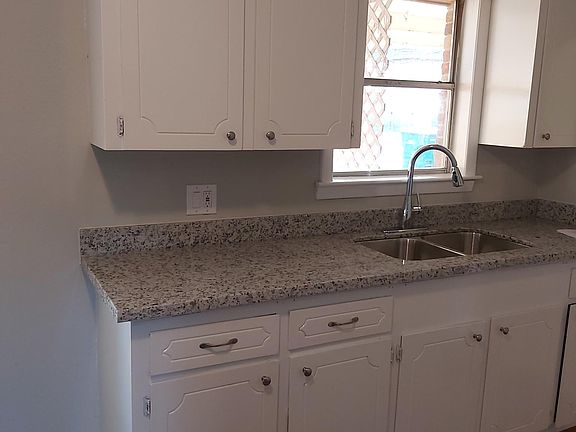 Updated kitchen with granite countertops