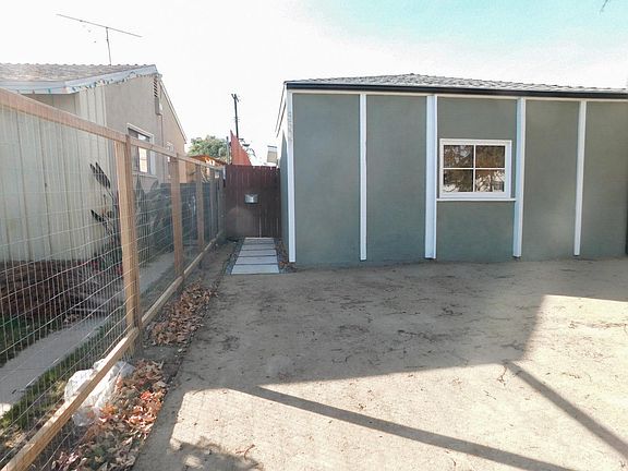 Entrance to Unit is the gate seen in photo
