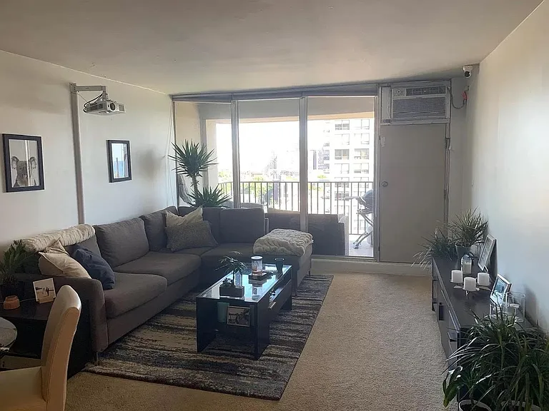 OLD PHOTO. Living room that is now All White...excluding accent wall Right Side now Navy Blue.