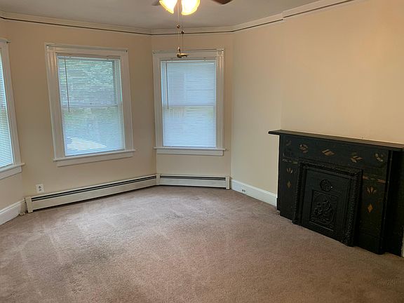 Living room with ornamental fireplace