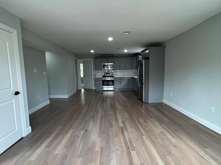 First Floor Living Room with Kitchen View