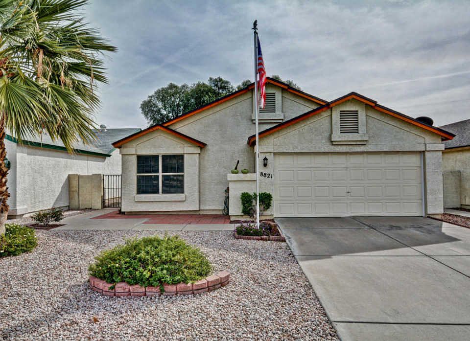 1st image of 8821 W Greenbrian Dr