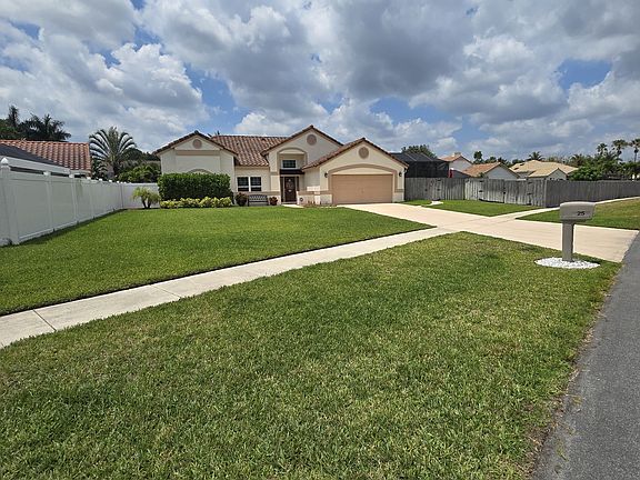 large front yard and driveway