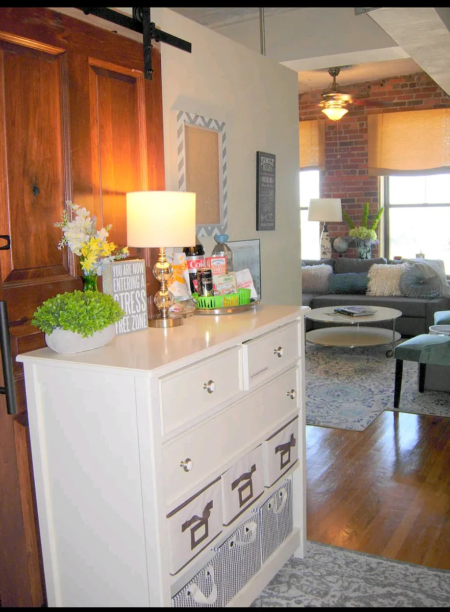 Entry Hall with storage closet, ample storage, office supplies. - 2261 Blake St #6F