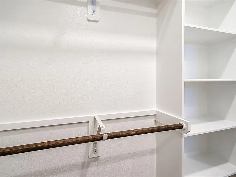 Master Walk-In Closet with installed shelves