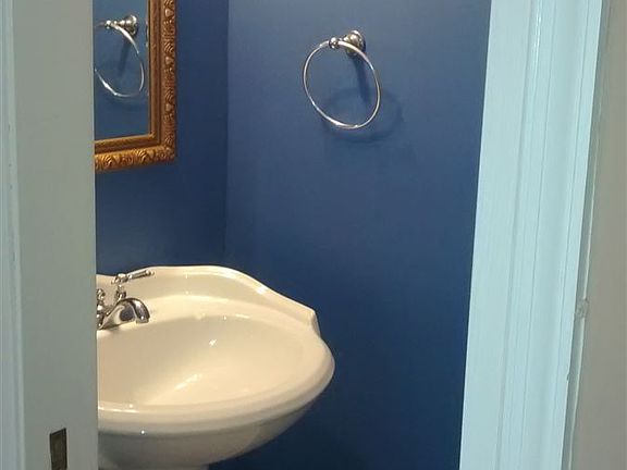 half bath by kitchen