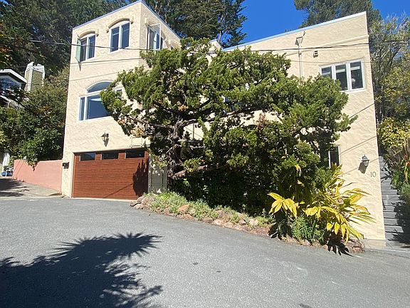 Front of house with brand new garage door