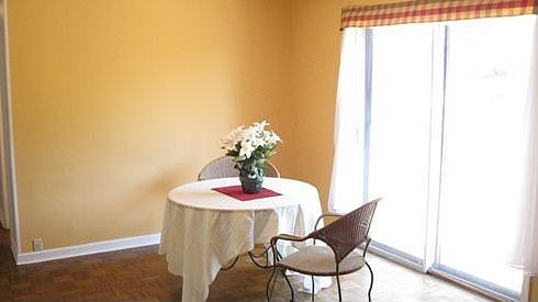 Large dining area leads out to deck