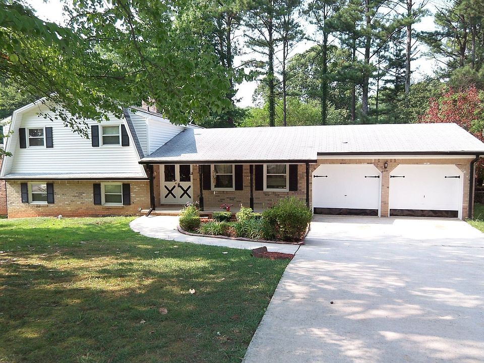 Front home view - level lot & Fenced b'yard!