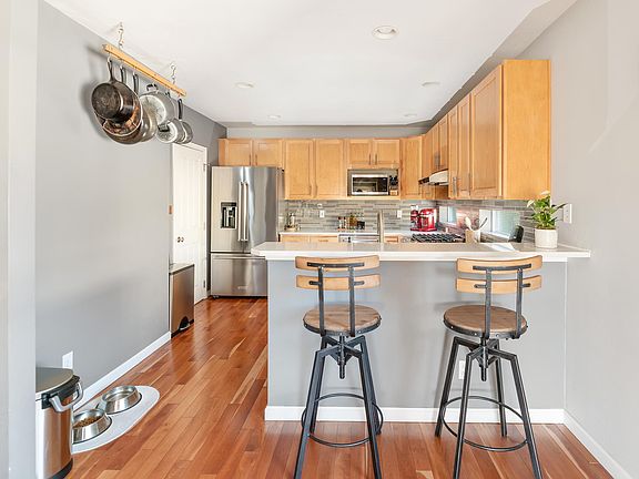 Recently upgraded kitchen includes bar top for extra dinning seating.