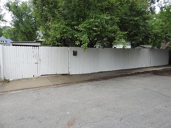 Front fence with gate doors closed