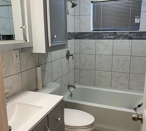 Newly remold Bathroom, vanity, Tub/shower and toilet.