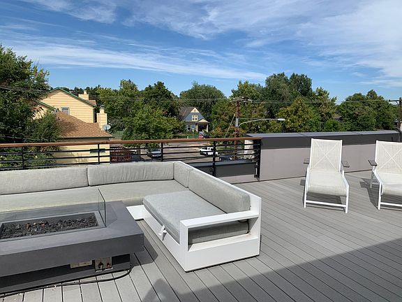 Rooftop fireplace and outdoor furniture (can stay or go)